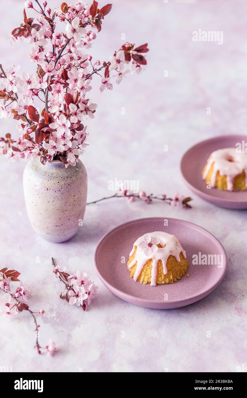 Mini Easter cakes with pink icing Stock Photo