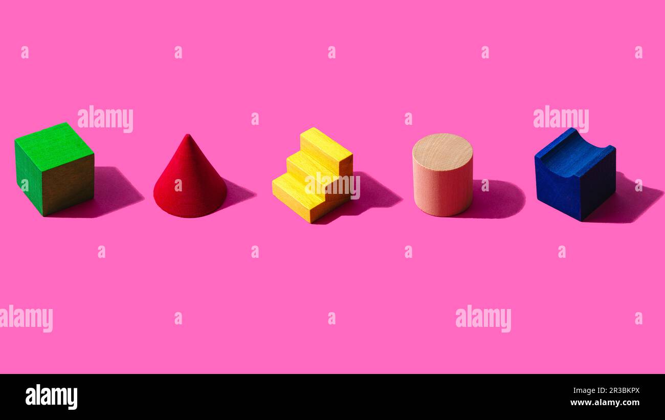 3D render of colorful toy blocks against pink background Stock Photo ...