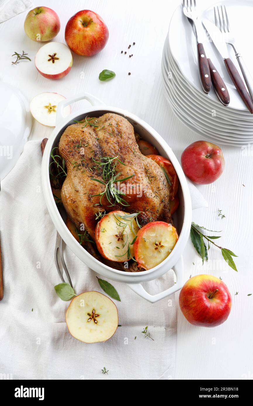 Roasted duck with apples Stock Photo Alamy