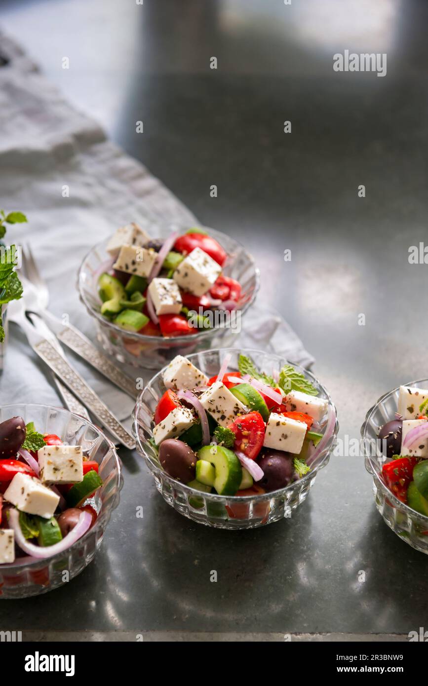 Traditional greek salad in small glass bowls stock photo alamy