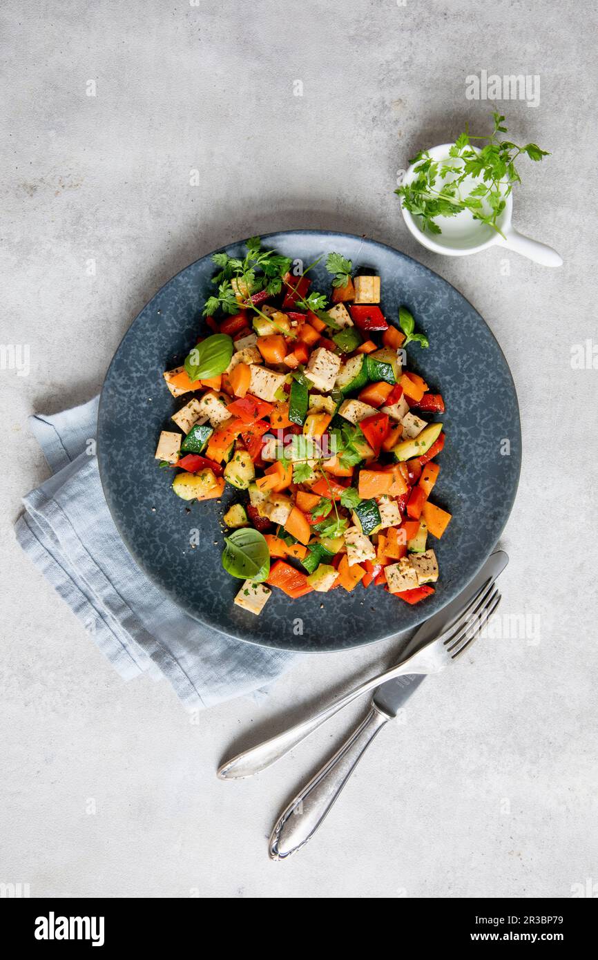 Vegetable dish with tofu Stock Photo - Alamy