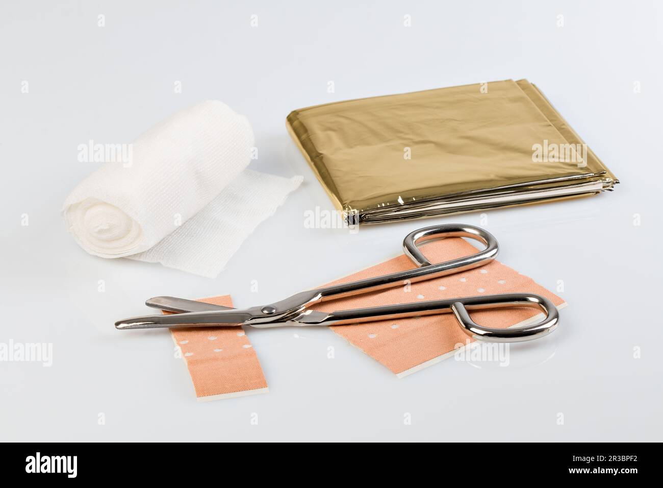 Plaster bandage roll and scissors Stock Photo Alamy