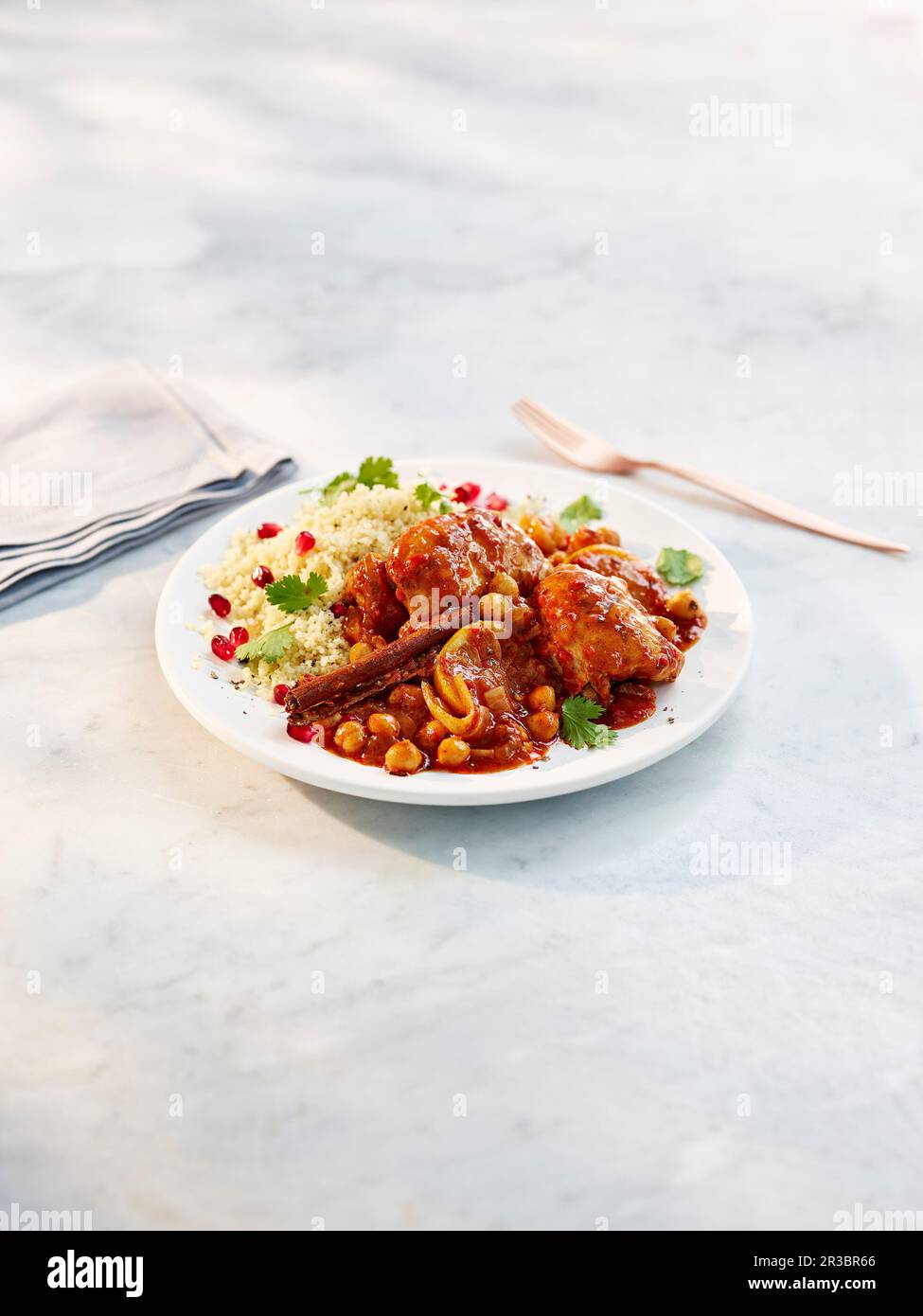 Chicken tagine with chickpeas and couscous Stock Photo Alamy