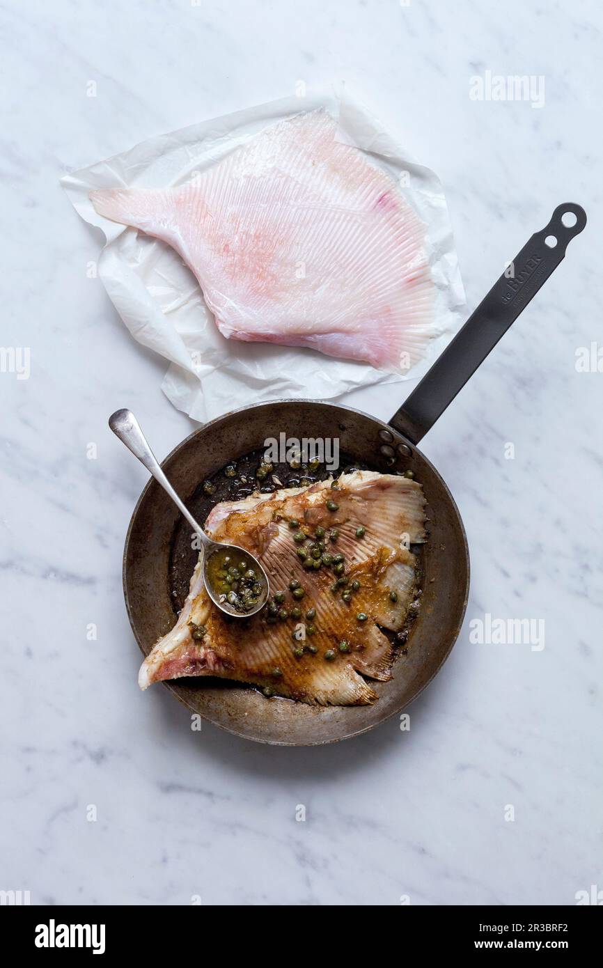 Skate wings with caper butter Stock Photo Alamy