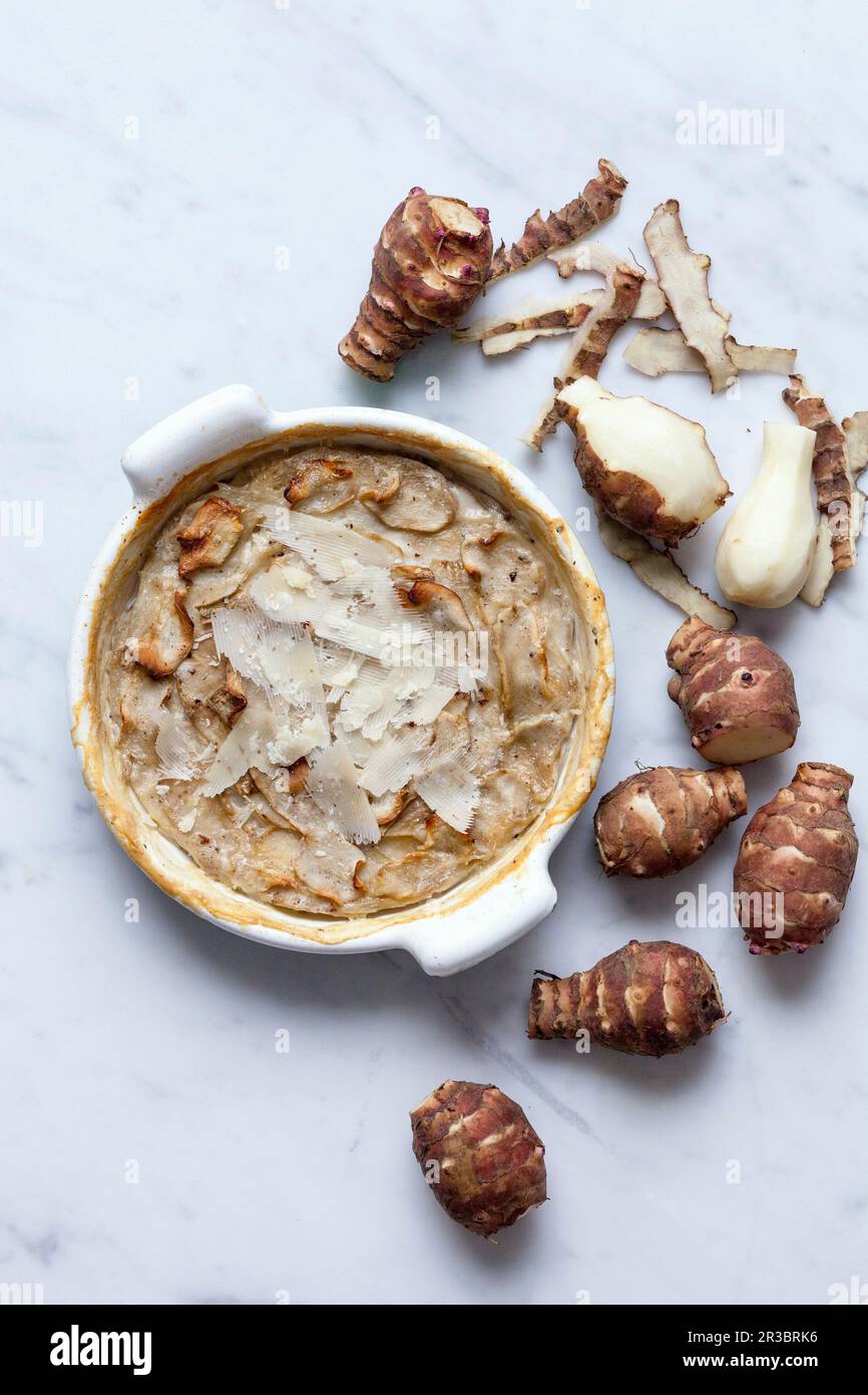 Jerusalem artichoke gratin Stock Photo Alamy