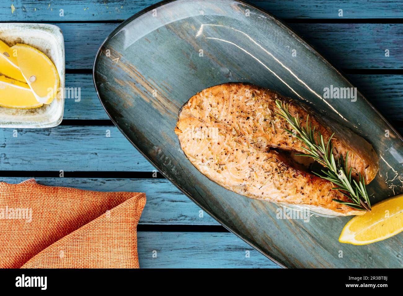Grilled fish with herbs and lemon Stock Photo