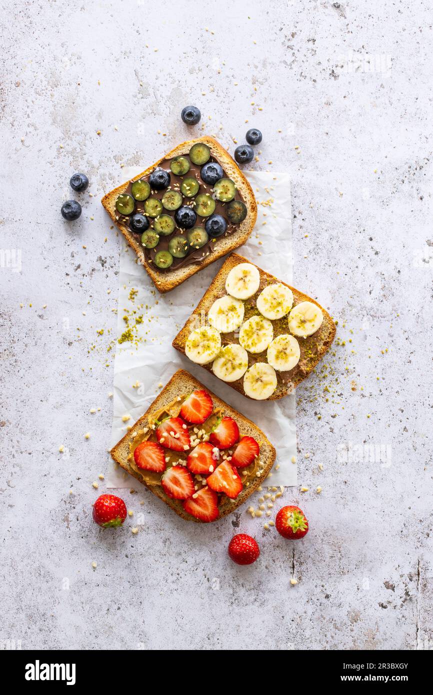 Homemade wholemeal toast with sweet spreads and fruits Stock Photo Alamy