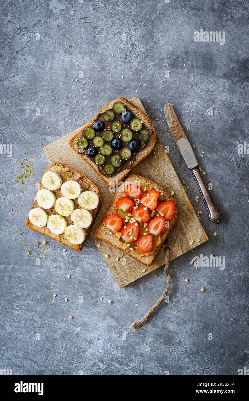 Homemade wholemeal toast with sweet spreads and fruits Stock Photo Alamy