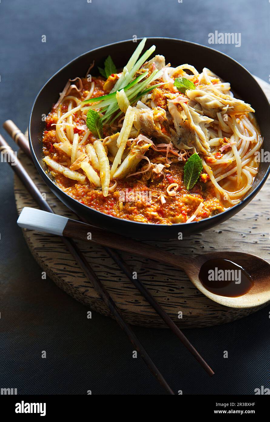 Penang Laksa (noodle dish with vegetables in fish broth, Malaysia Stock