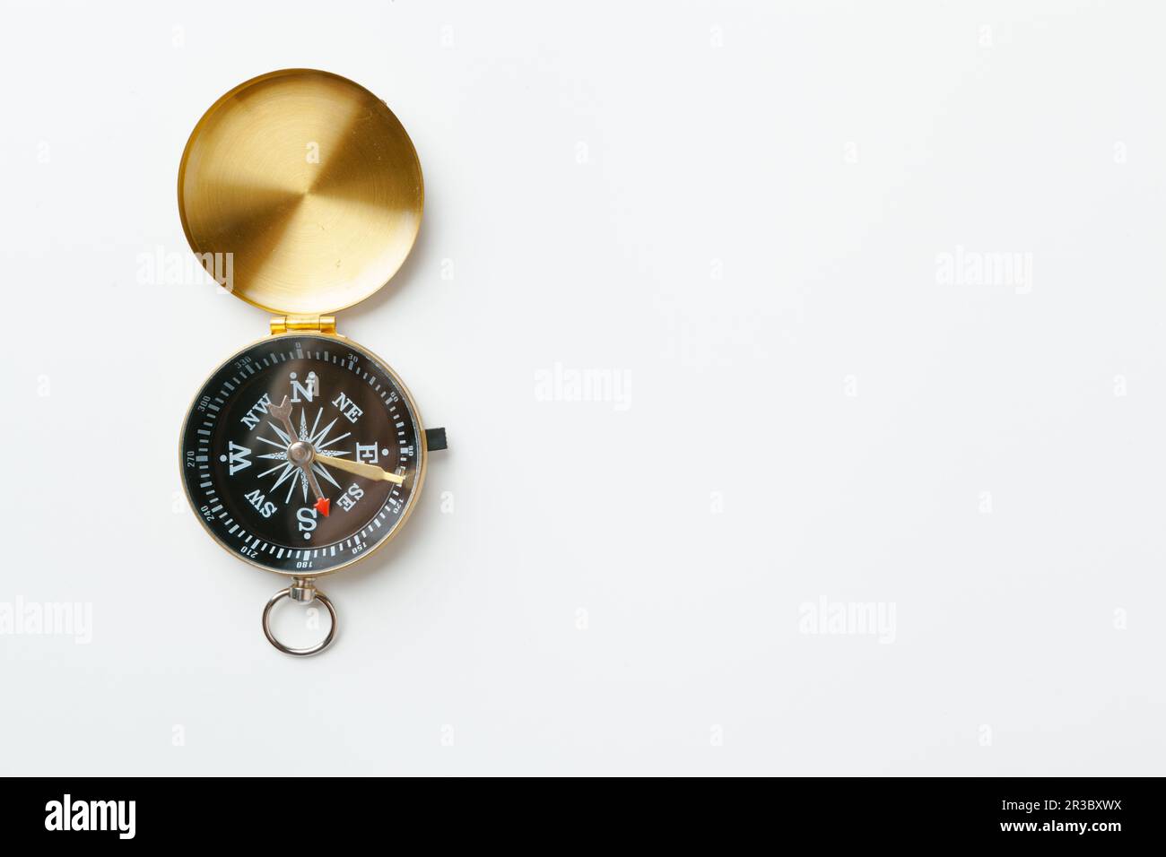 Golden vintage compass isolated on white background Stock Photo - Alamy