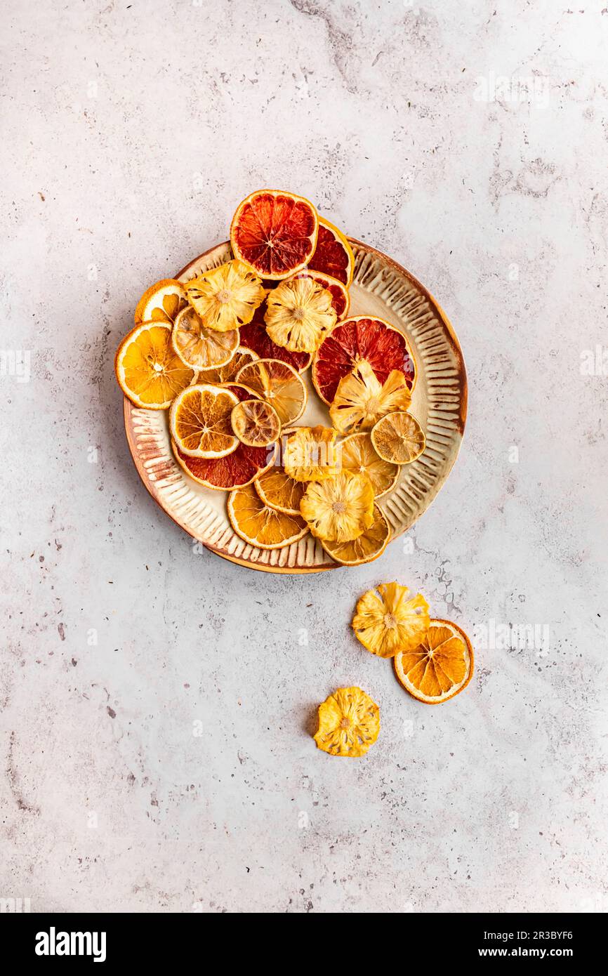 Dried Citrus (Grapefruit, Limes, Lemon and Oranges) and Dried Pineapple Flowers Stock Photo