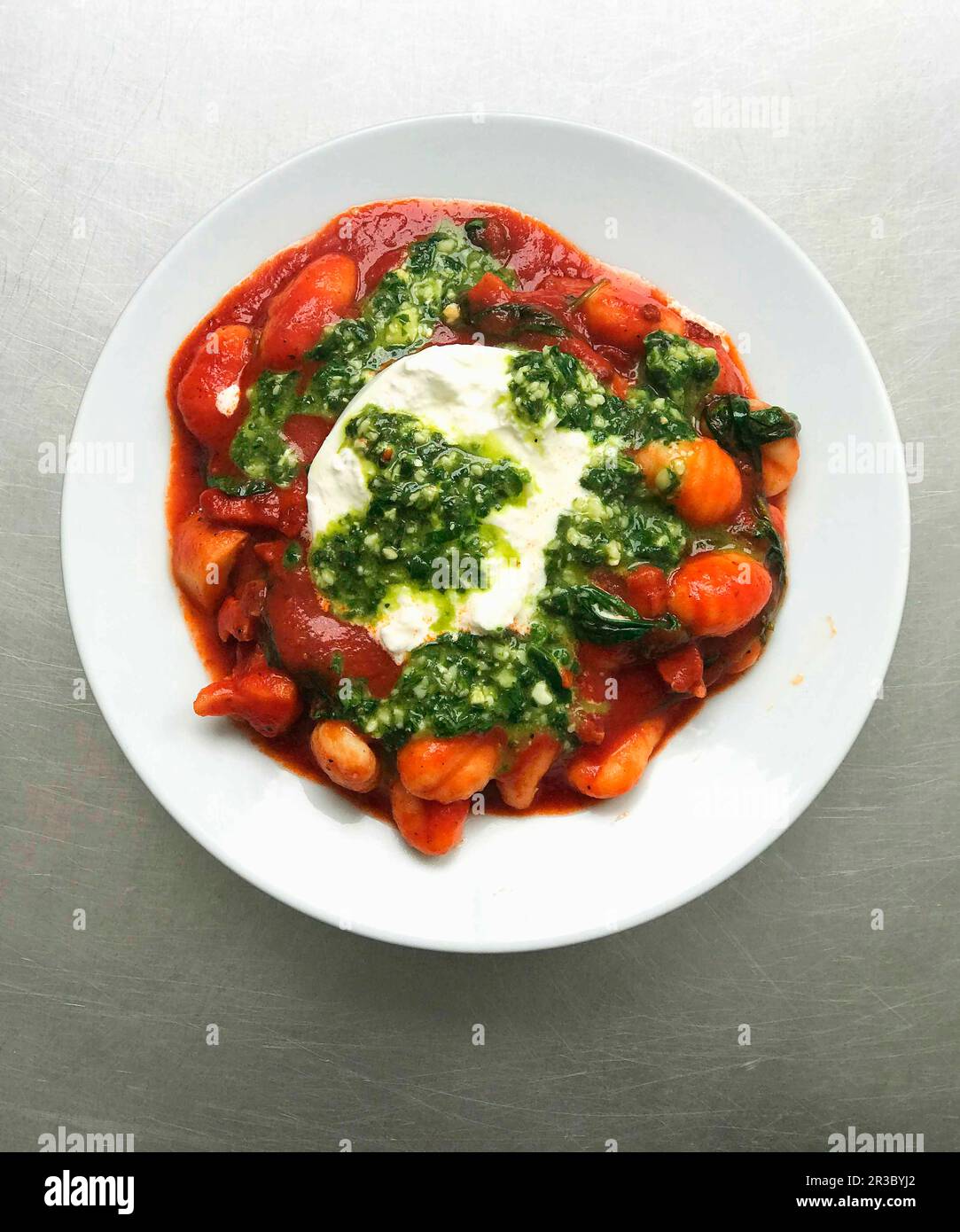 Gnocchi with Sausage, Burrata and Pesto Stock Photo Alamy