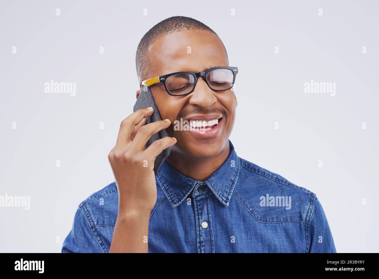 Phone call, laugh and black man in studio with smile for conversation