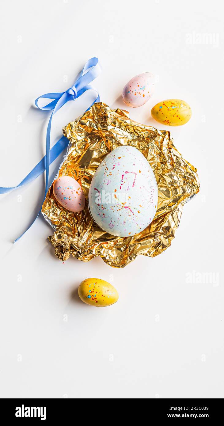 Pastel coloured chocolate Easter eggs Stock Photo