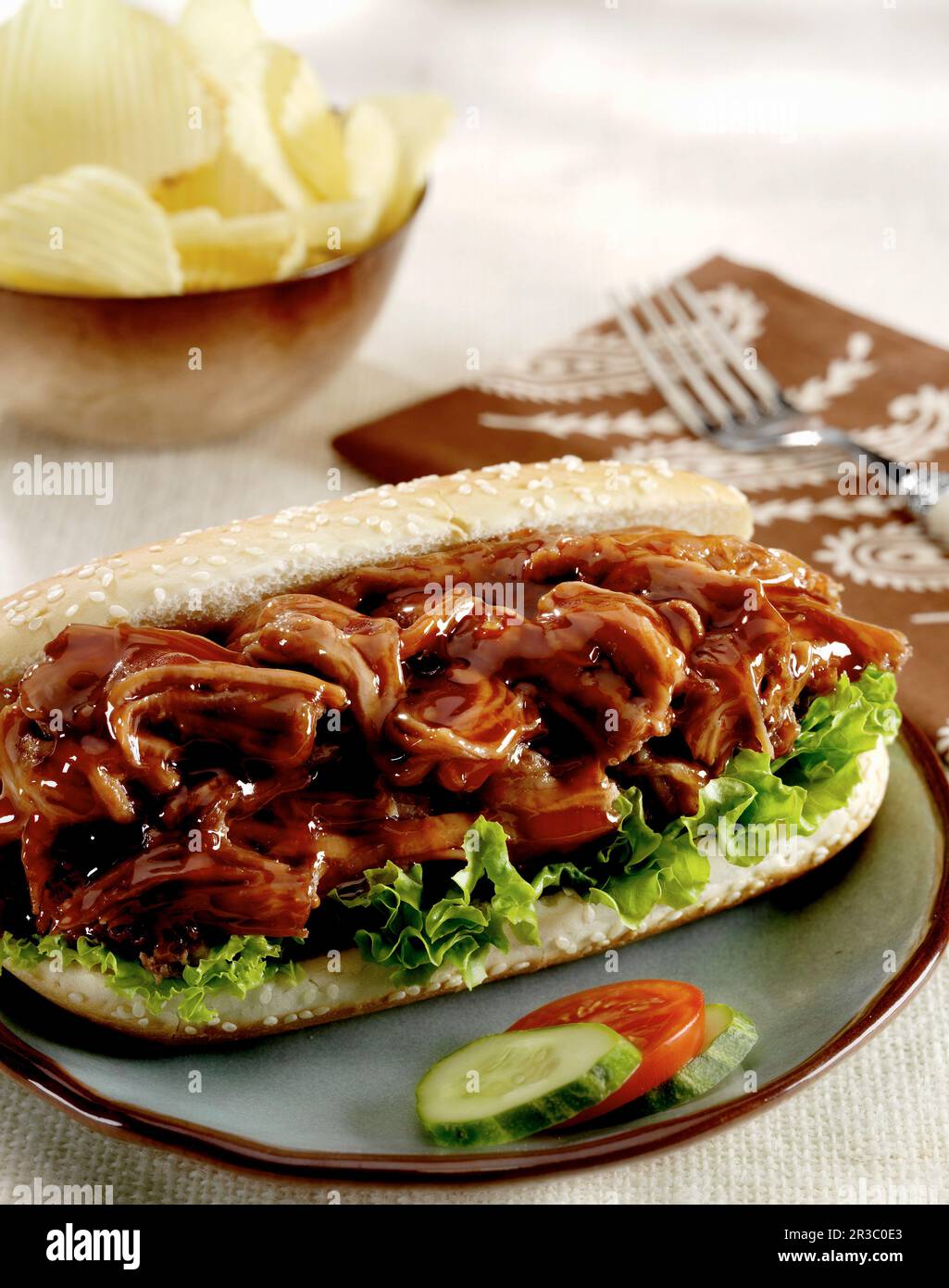 Shredded BBQ beef on a sesame hoagie roll Stock Photo Alamy