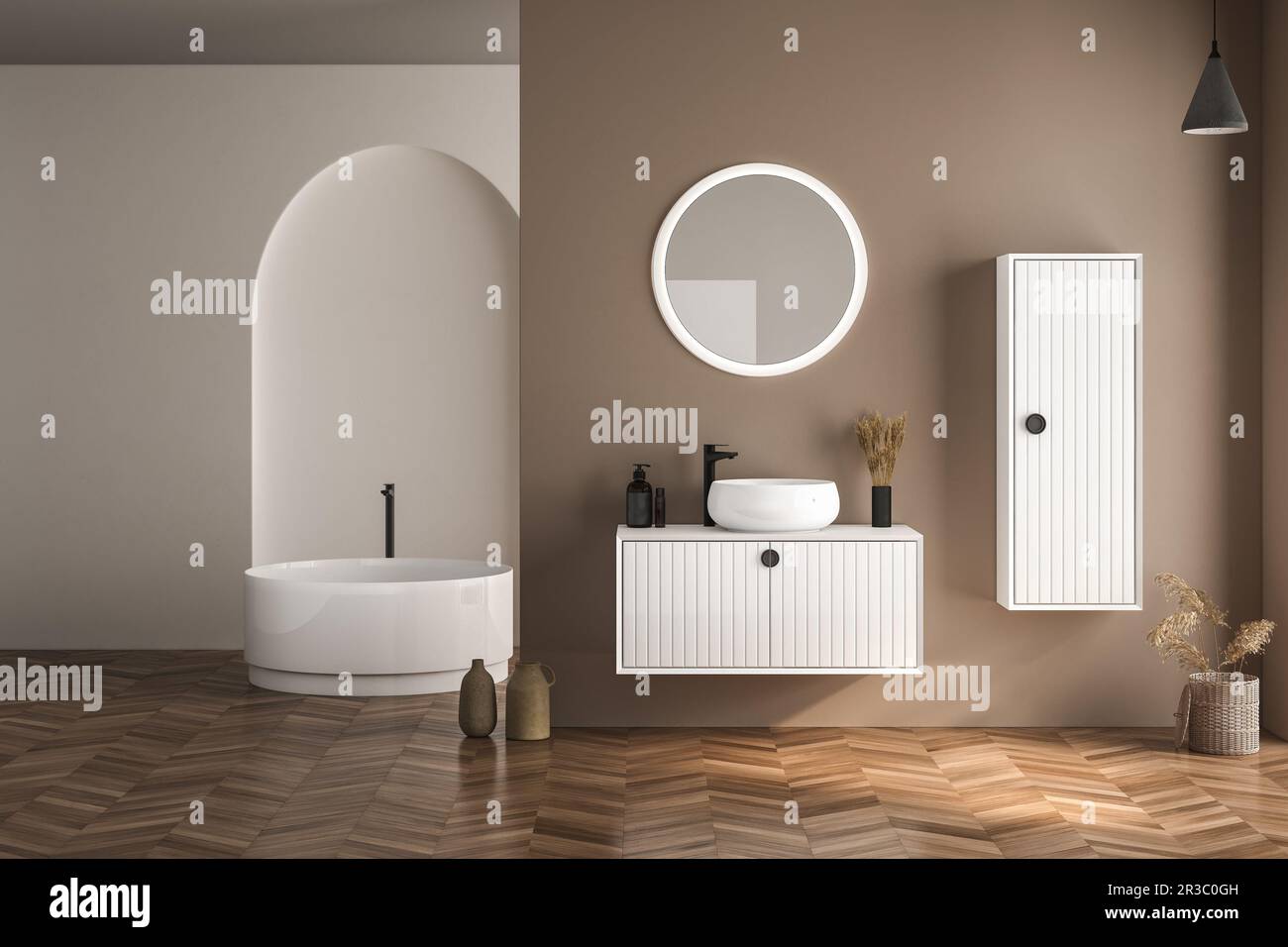 Modern bathroom interior with beige walls, white basin with oval mirror ...