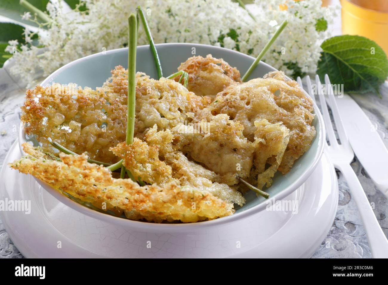 Elderberry flowers fried in pancake batter Stock Photo Alamy