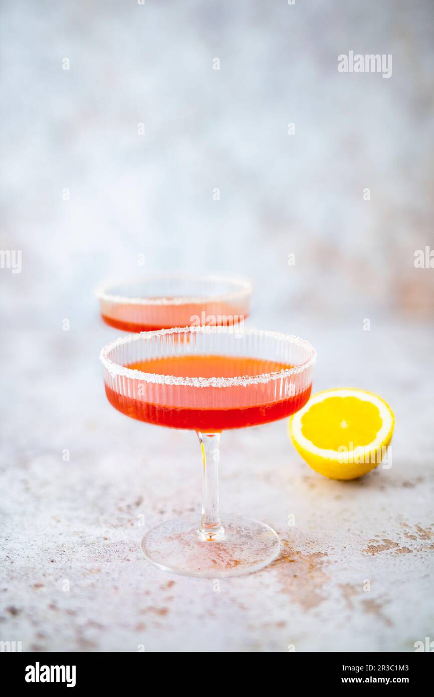 Greek Sidecar (cocktail with brandy and pomegranate liqueur Stock Photo