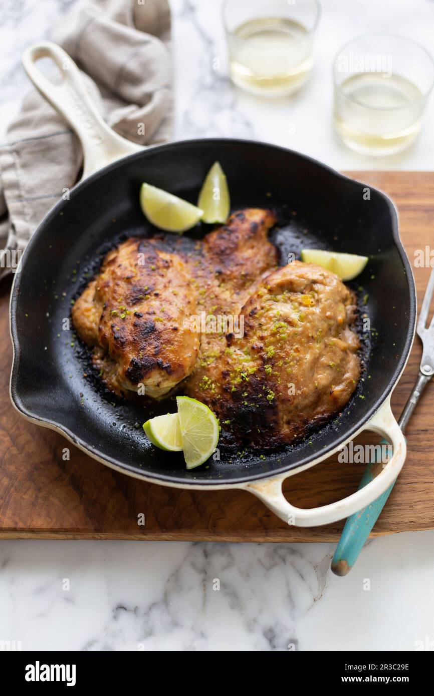 Pan fried chicken pieces with peanut butter Stock Photo Alamy