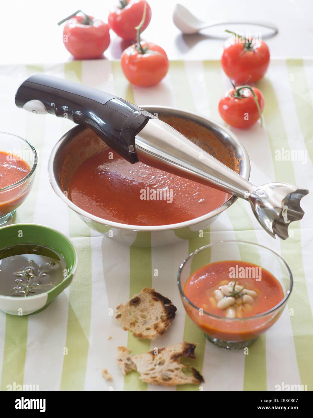 Gazpacho with hand blender Stock Photo