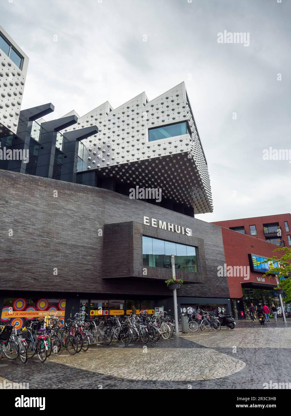 Culture House Eemhuis designed by Michiel Riedijk housing a library, education institutes, a school for arts and exhibition spaces in the city of Amersfoort, Netherlands, Europe. Stock Photo