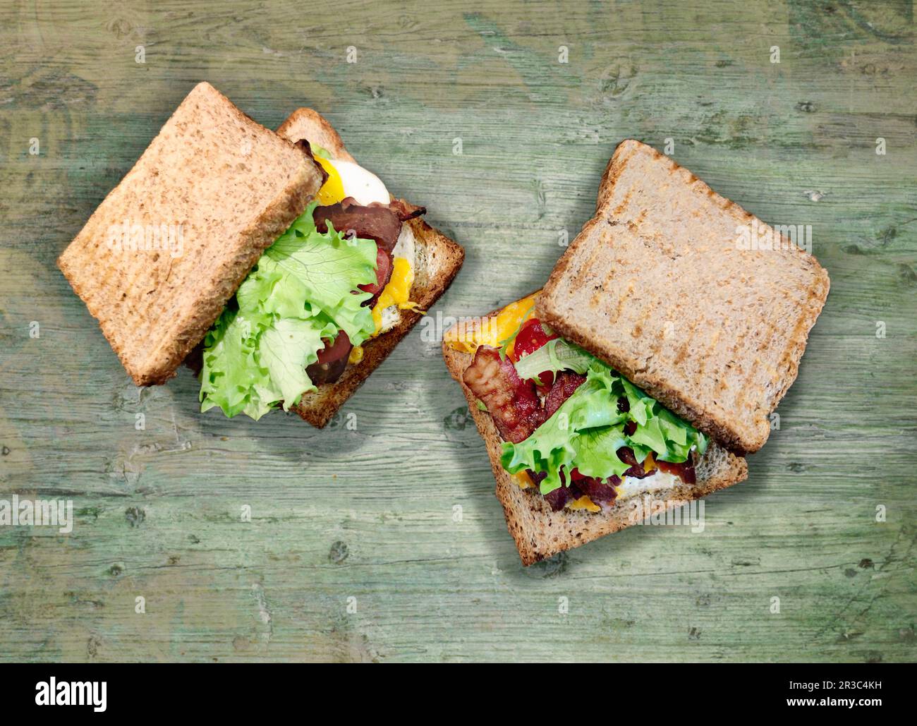 Bacon, tomato and egg sandwiches Stock Photo