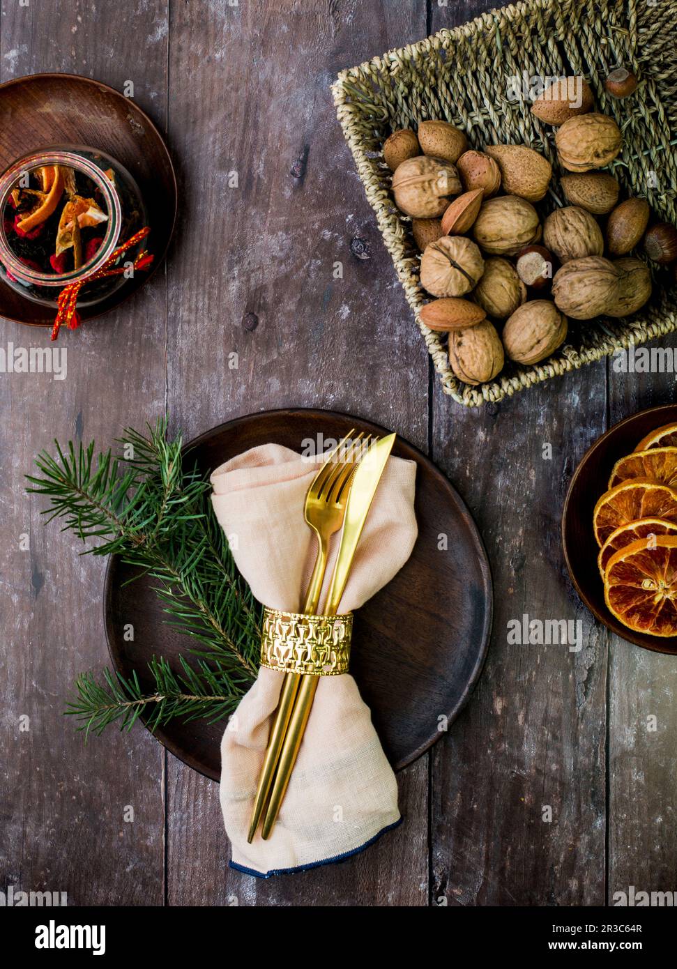 Christmas table setting on rustic wooden table Stock Photo
