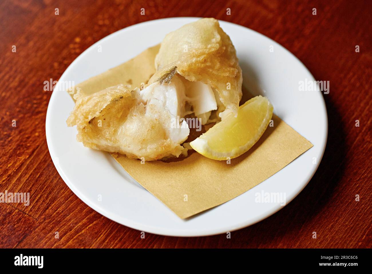 Deep fried white fish with lemon Stock Photo Alamy