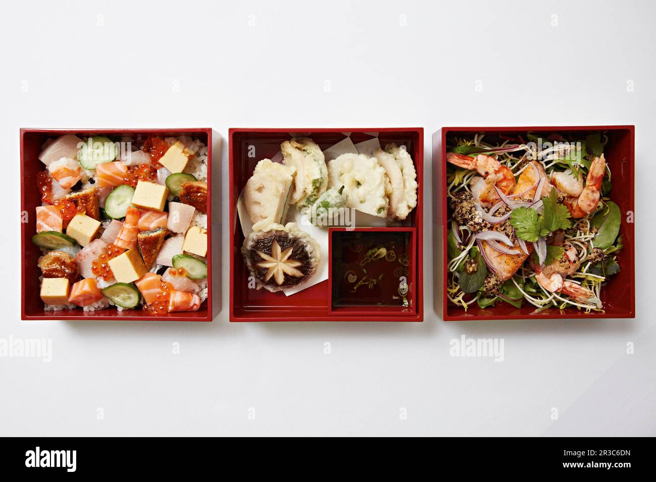 Bento boxes with sushi, tempura dn prawns Stock Photo Alamy