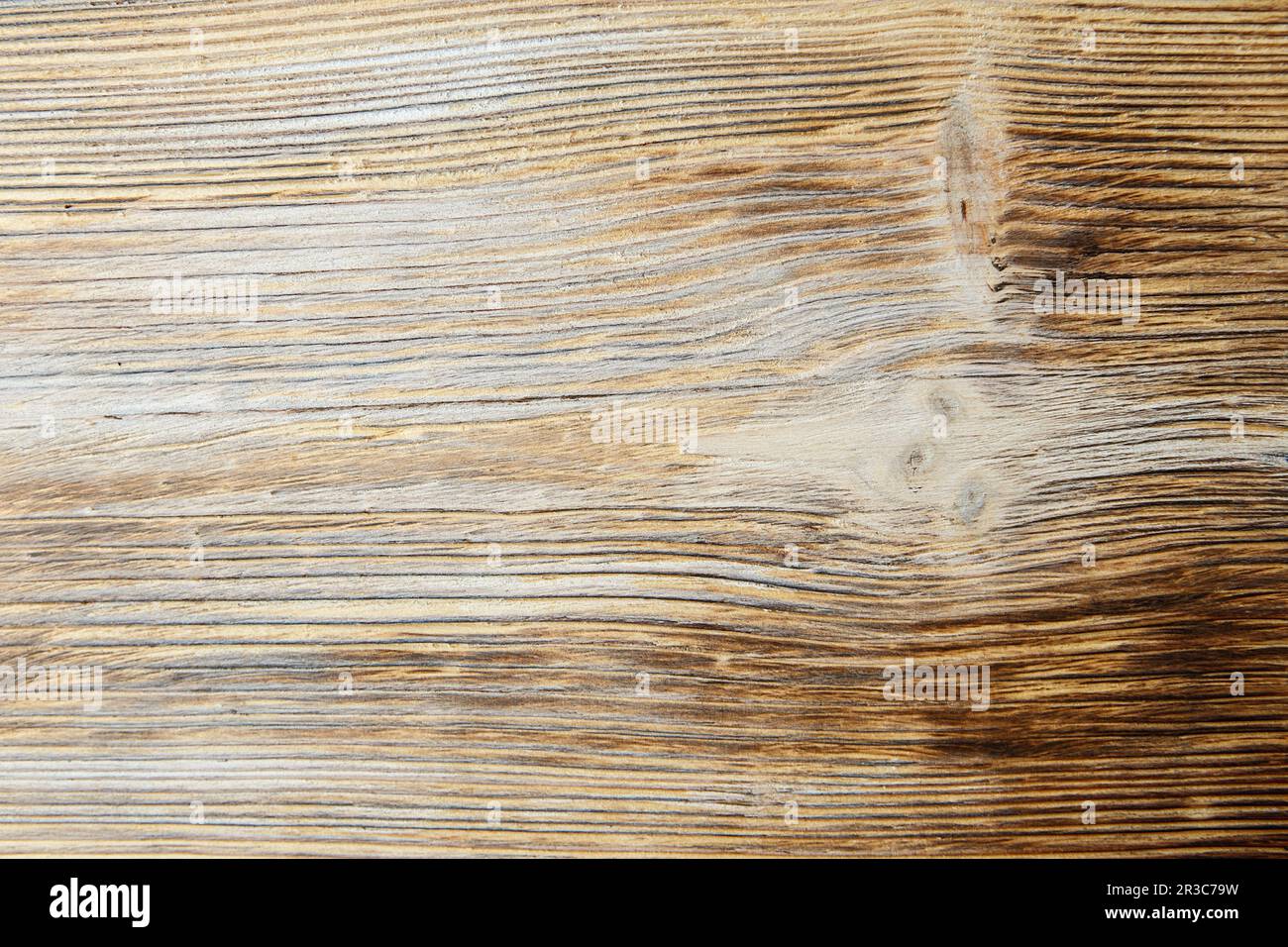 Wooden background texture. Brown scratched wooden cutting board. Wood texture Stock Photo