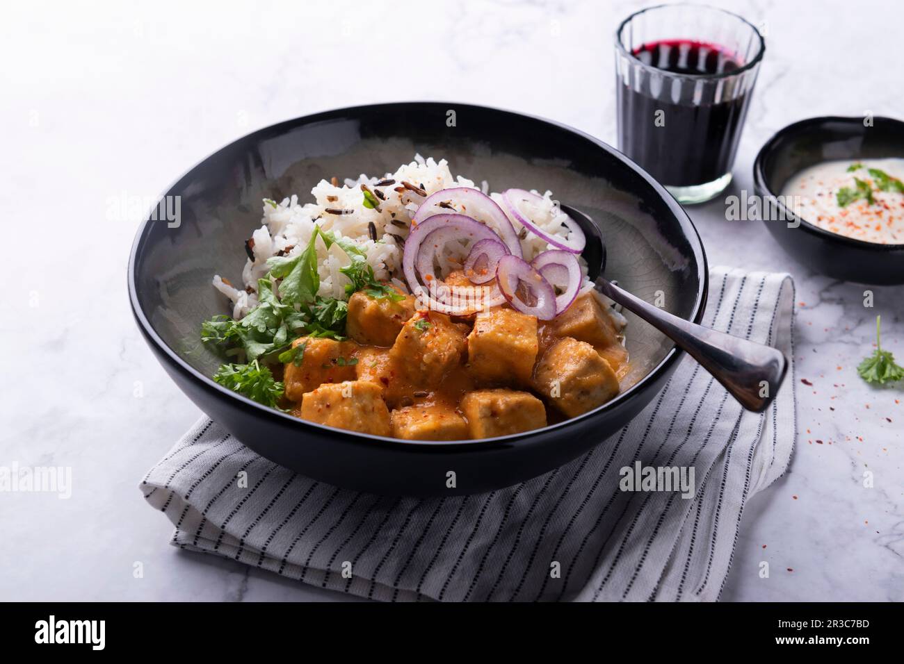 Vegan tofu tikka masala with basmati wild rice mix Stock Photo Alamy