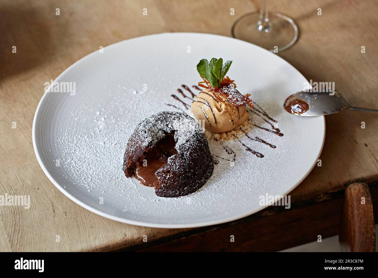 Chocolate pudding with salted caramel ice cream Stock Photo