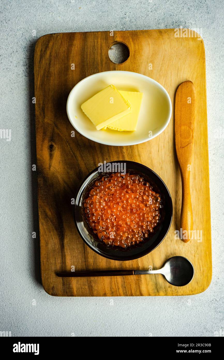 Red fresh trout fish caviar served in a bowl Stock Photo