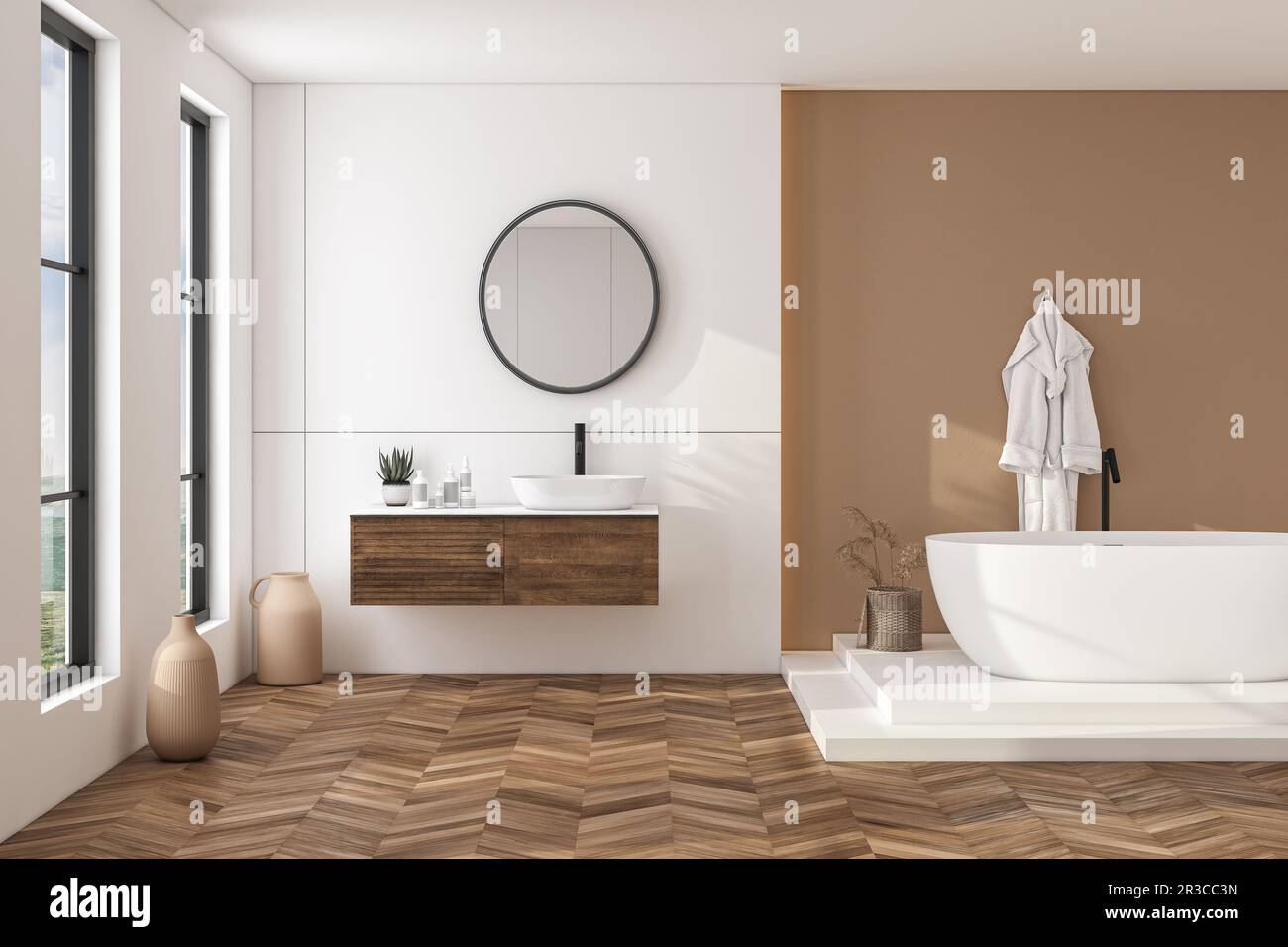 Modern bathroom interior with beige walls, white sink with oval mirror ...