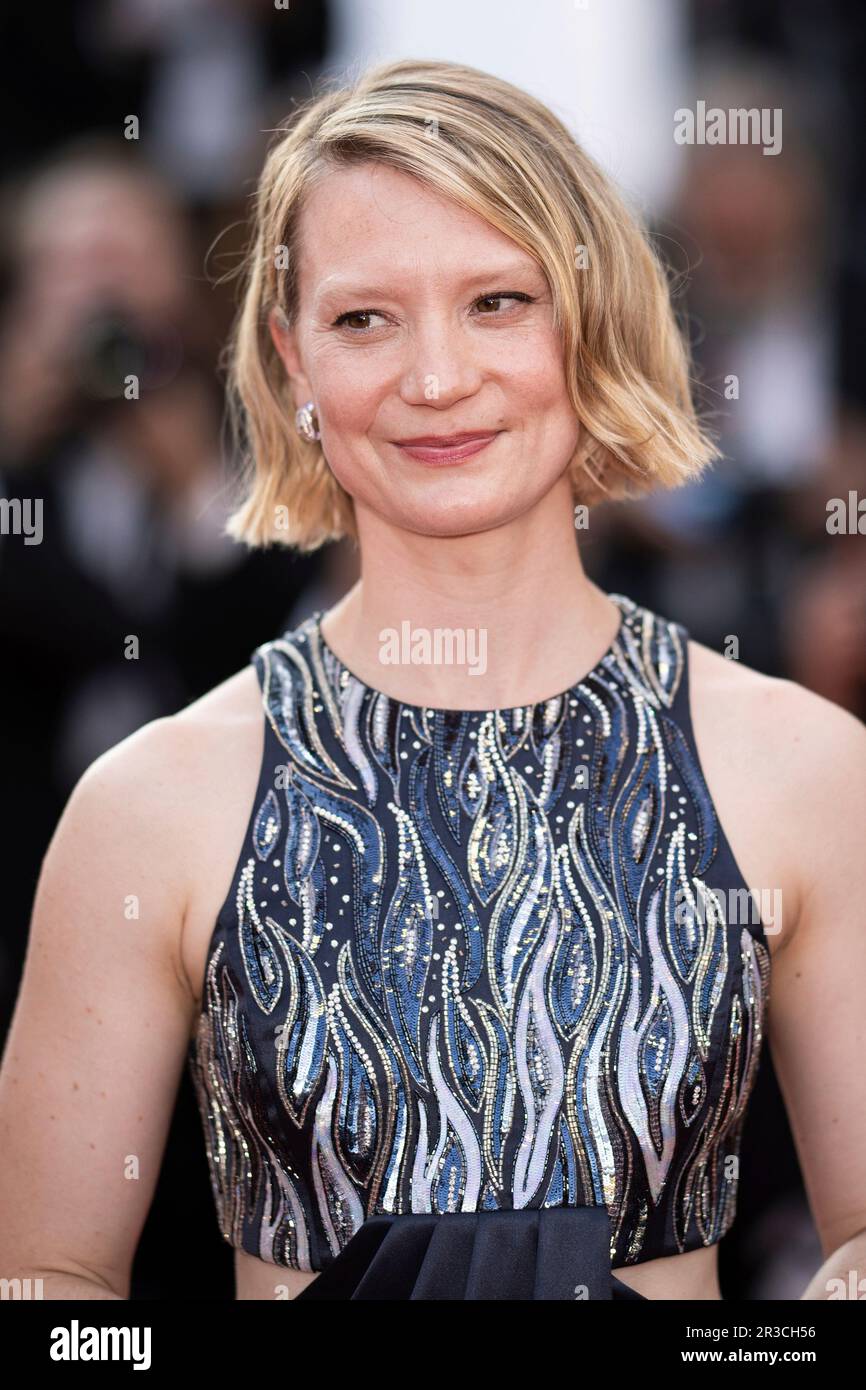 Mia Wasikowska poses for photographers upon arrival at the premiere of