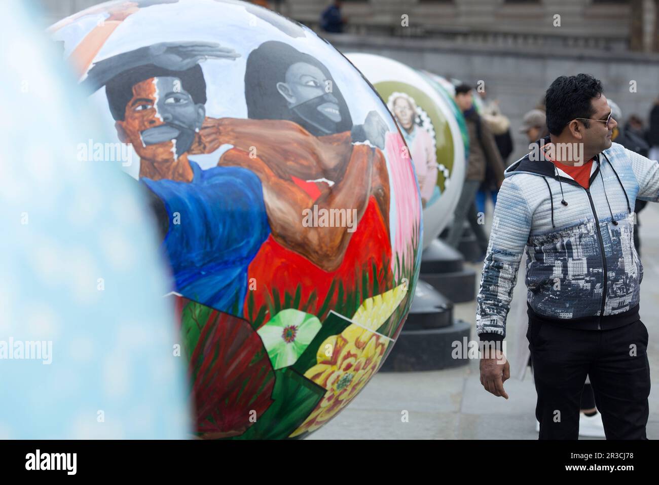 Globes made by artists.are seen as part of The World Reimagined installation for racial justice in Trafalgar Square, London. Stock Photo