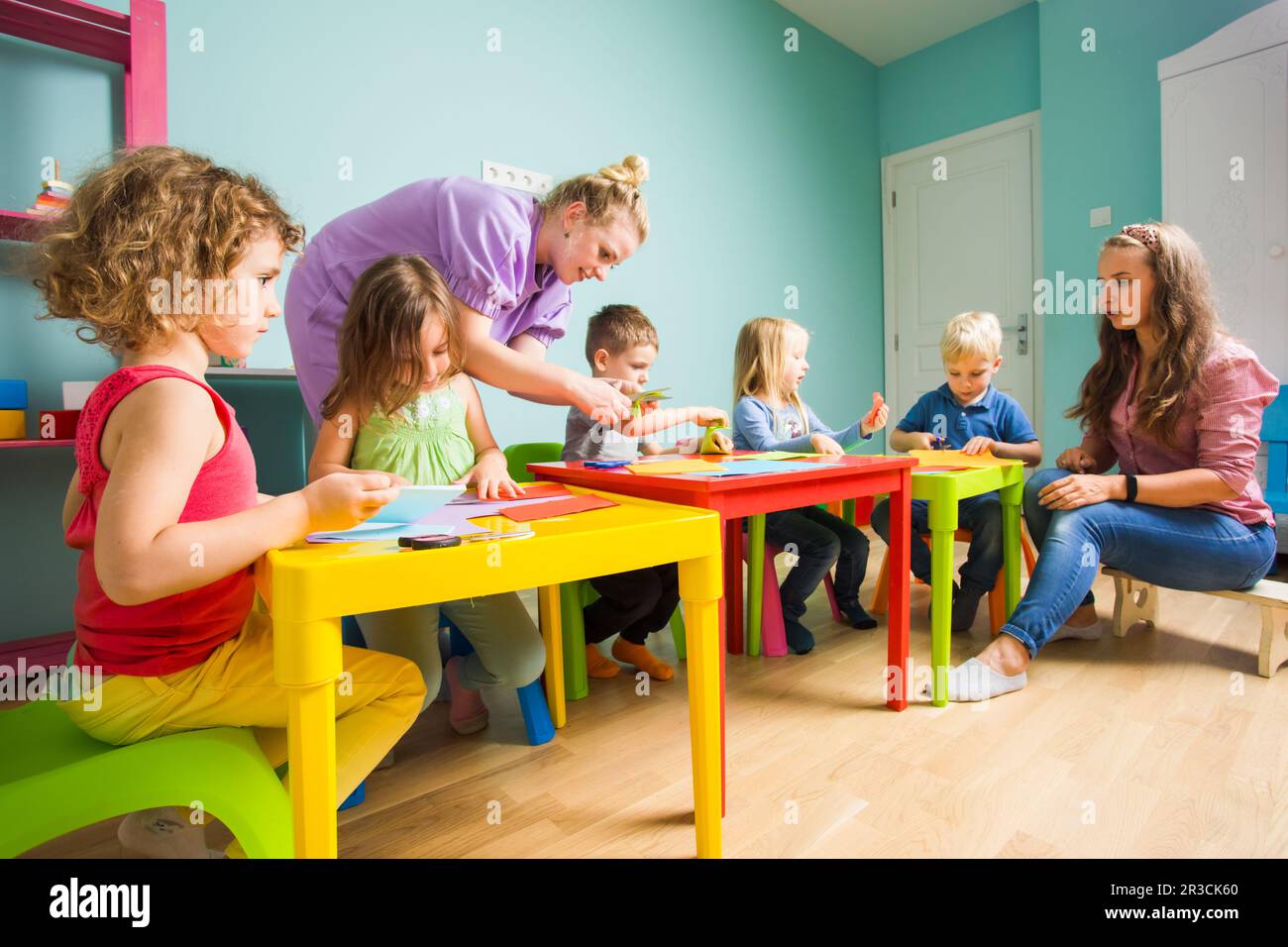 The preschool students with a tutor activities in art class Stock Photo