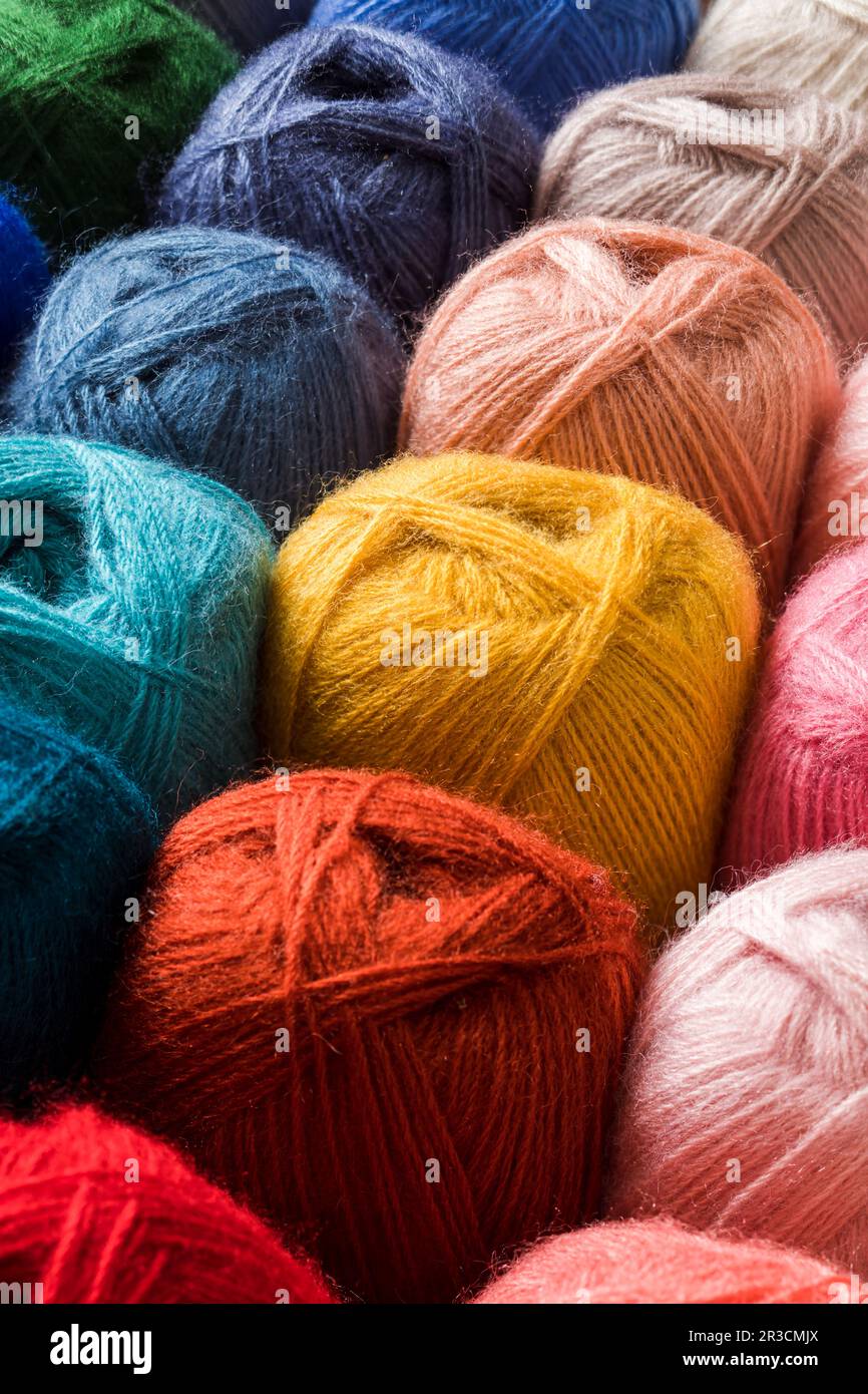 Colorful threads. Selection of colorful yarn wool on shopfront. Knitting  background, a lot of balls. Knitting yarn for handmade winter clothes.  Stock Photo by ©davit85 293143384