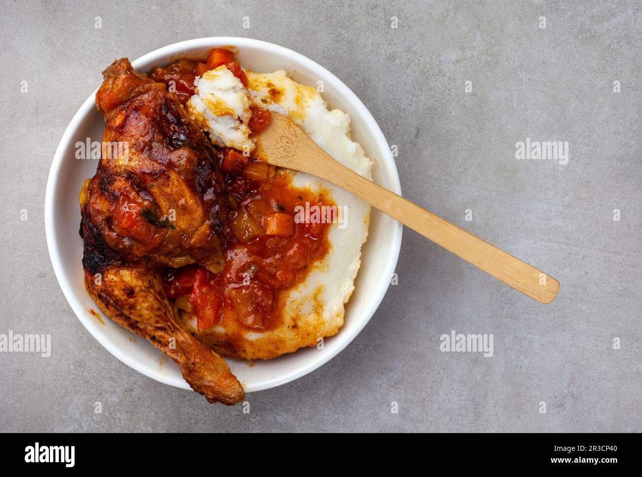 Traditional South African pap or maize meal with traditional sauce of