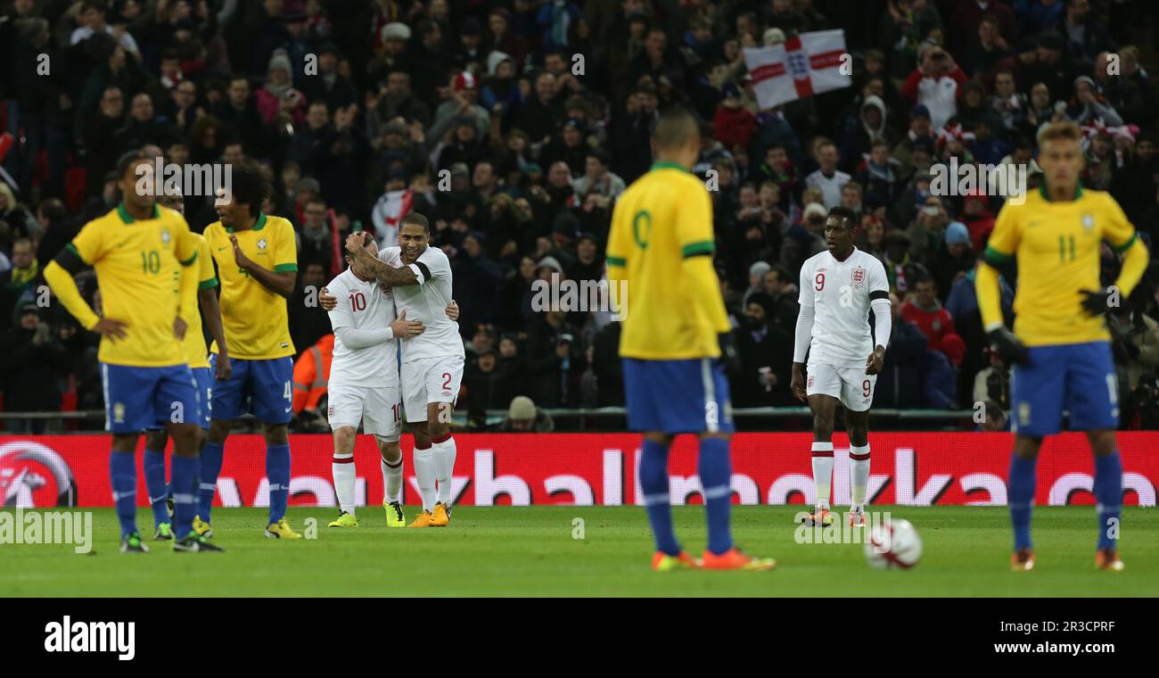 England's Wayne Rooney celebrates scoring the opening goal with England's Glen Johnson. England are beating Brazil 1:0England 06/02/13 England V Brazi Stock Photo