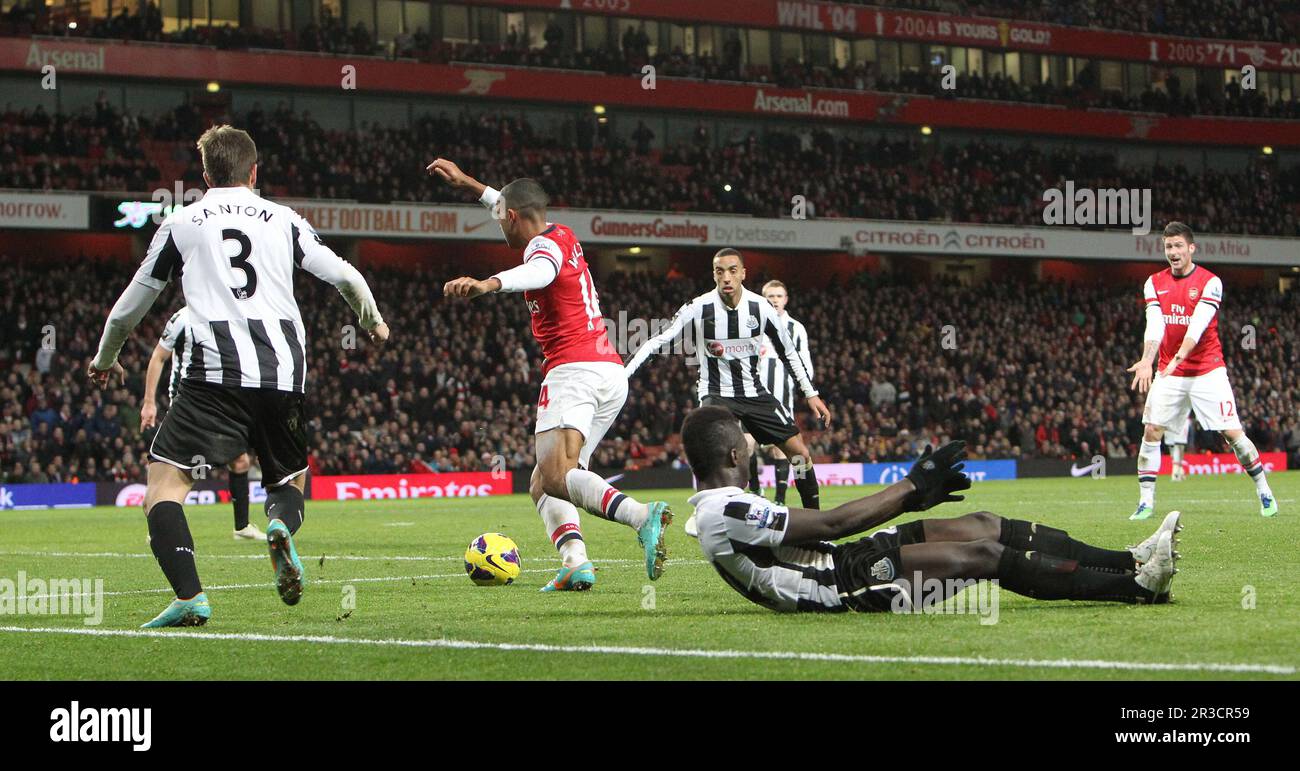 Arsenal's Theo Walcott mazy run ends with him scoring Arzenal's seventh goal and his hat trick of the game. Arsenal beat Newcastle 7:3Arsenal 29/12/12 Stock Photo