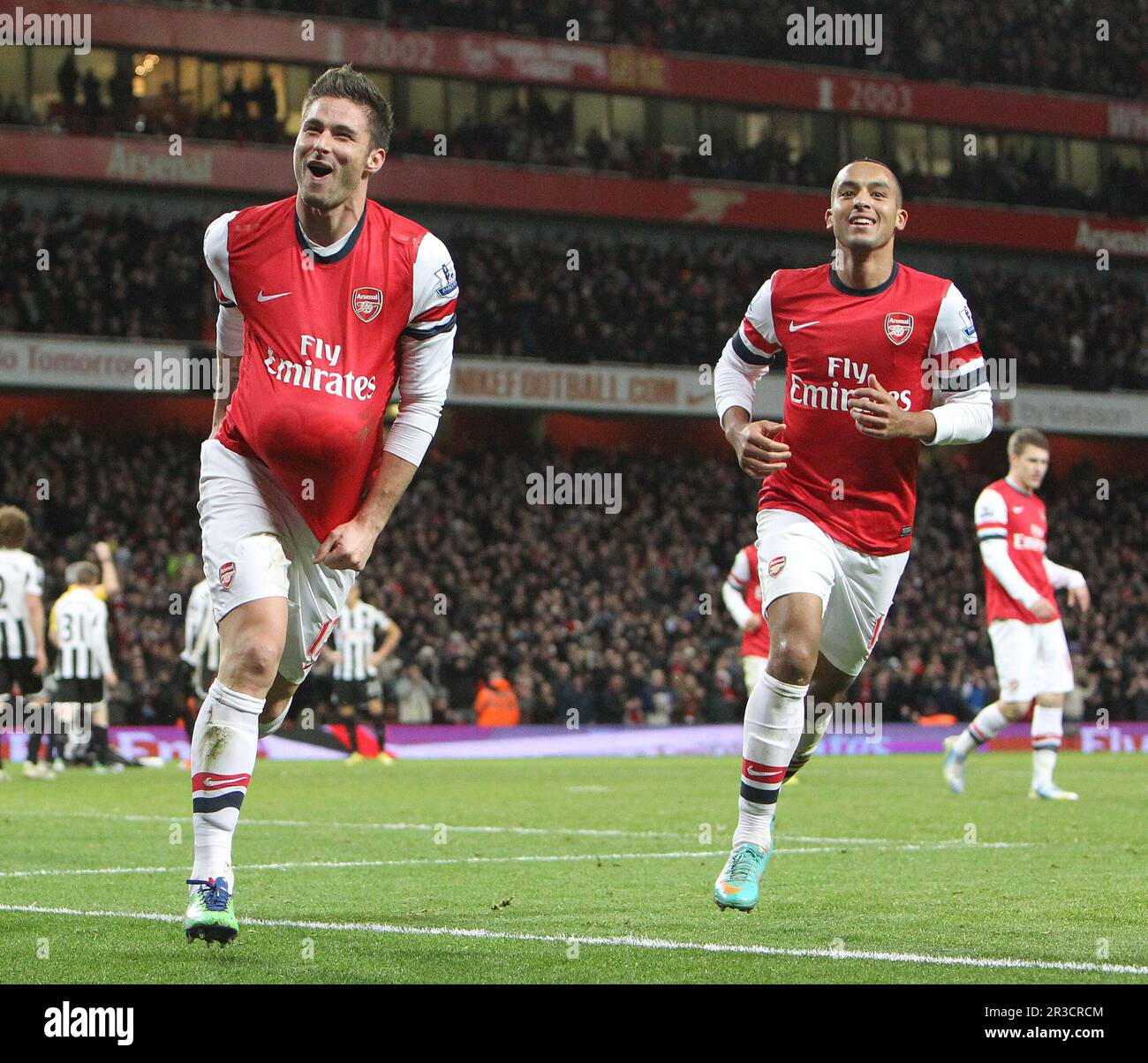 Arsenal's Olivier Giroud celebrates scoring his sides sixth goal with Arsenal's Theo Walcott. Arsenal beat newcastle 7:3 Arsenal 29/12/12 Arsenal V Ne Stock Photo