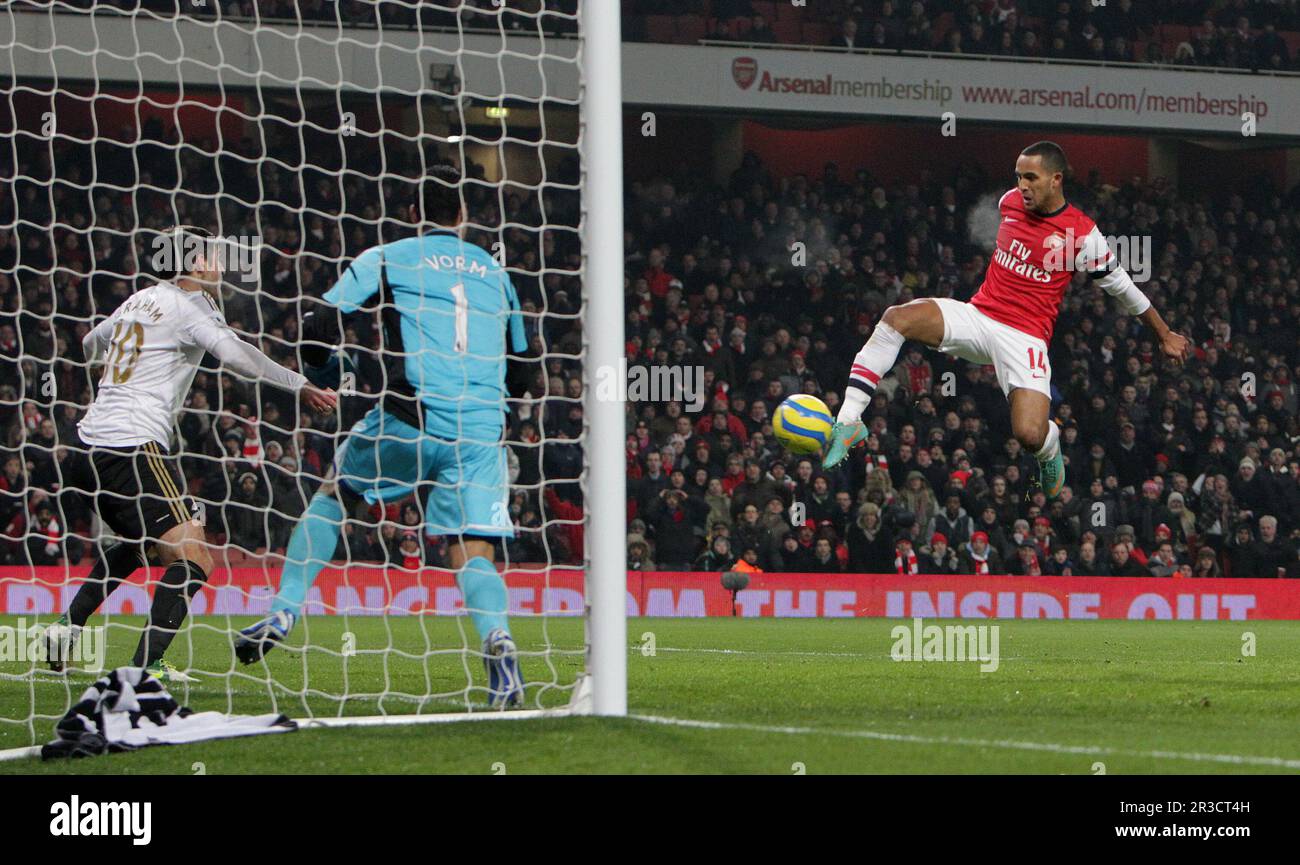 Arsenal's Theo Walcott kick on goal is cleared off the line by the chest of Swansea City's Danny Graham. The score is 0:0Arsenal 16/01/13 Arsenal V Sw Stock Photo