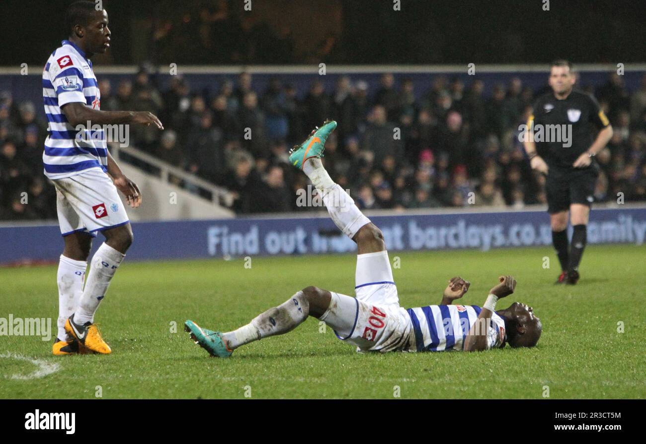 Queens Park Rangers' Stephane Mbia suffers from cramp. The game finishes a goalless draw.QPR 29/01/13 QPR V Manchester City  29/01/13 The Premier Leag Stock Photo