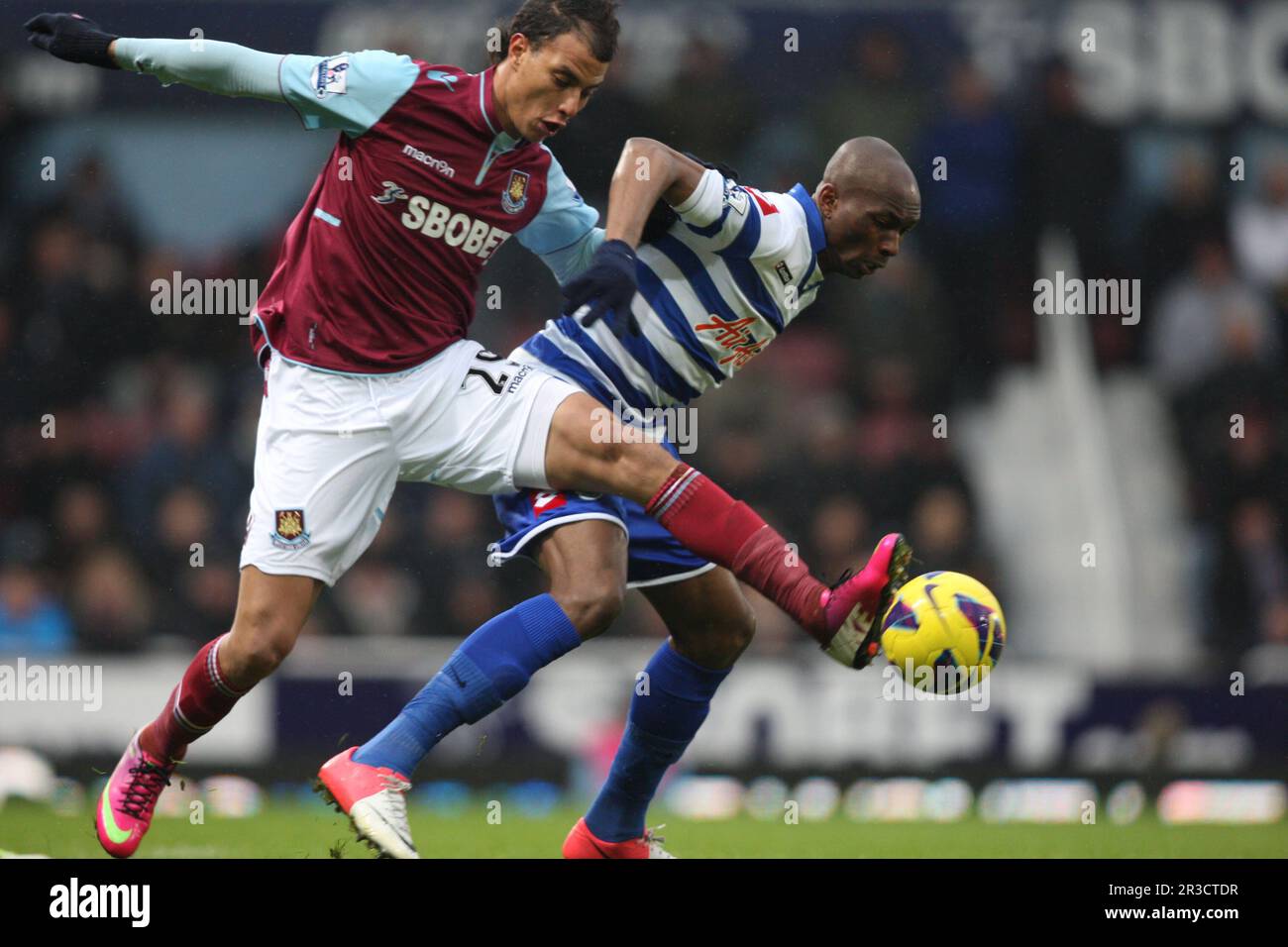 Marouane Chamakh of West Ham United (on loan from Arsenal) and Stephane Mbia of Queens Park RangersWest Ham United 2012/13 West Ham United V Queens Pa Stock Photo