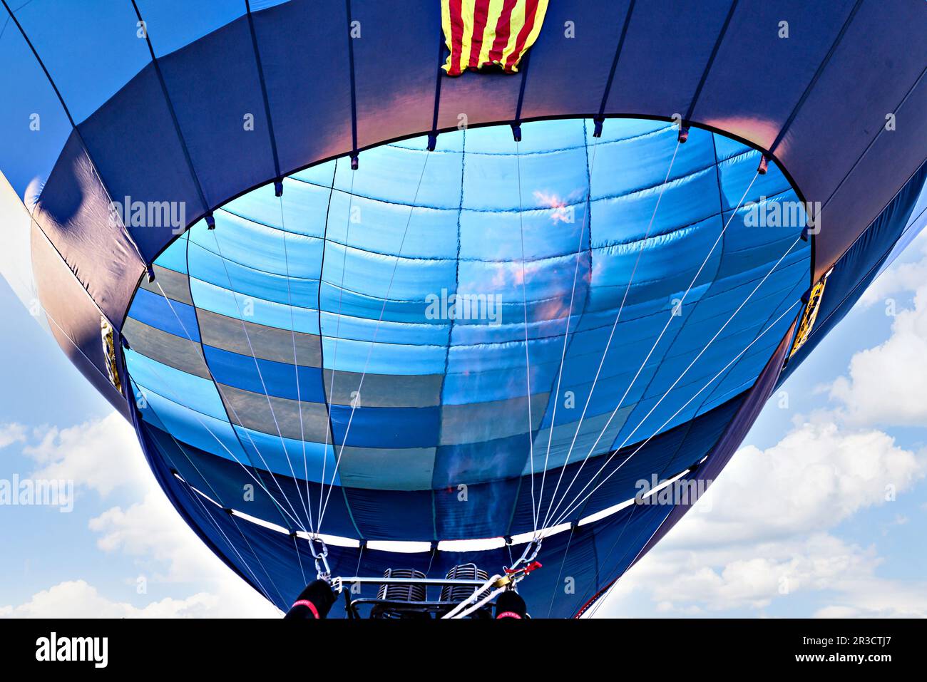 Blue hot air balloon flying on the blue sky with white clouds Stock ...