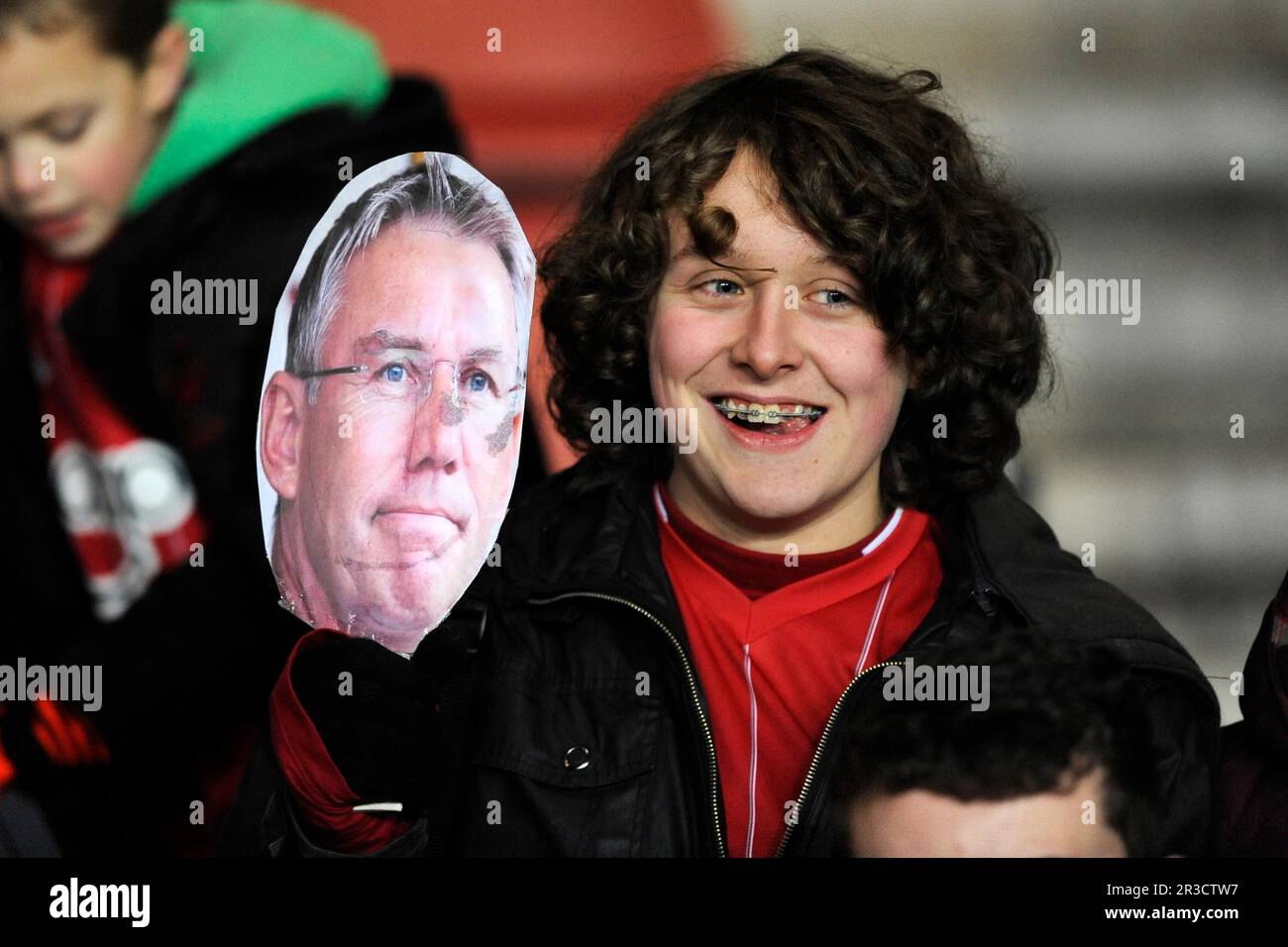 A young Southampton fan with a Nigel Adkins facemask during the Barclays Premier League match between Southampton and Everton at St Mary's on Monday 2 Stock Photo