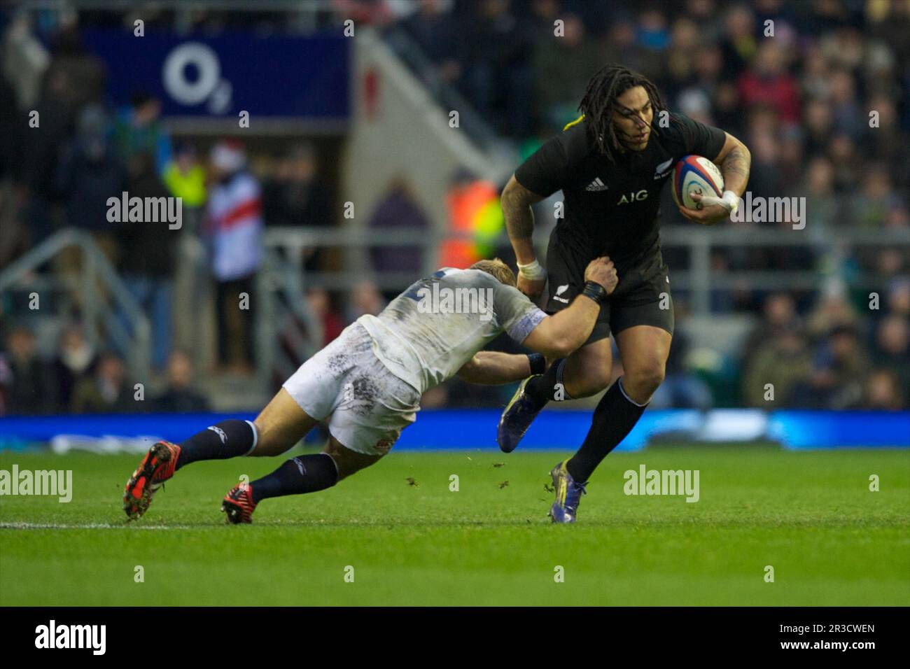 Ma'a Nonu of New Zealand is tackled by Tom Youngs of England during the QBE Autumn International match between England and New Zealand at Twickenham o Stock Photo