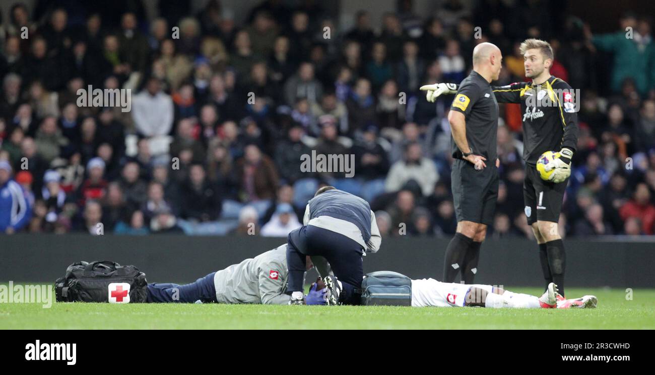 Queens Park Rangers' Stephane MBIA suffers a bad injury and i carried off on a stretcher.The game is level 1:1Queens Park Rangers 01/12/12 QPR V Aston Stock Photo