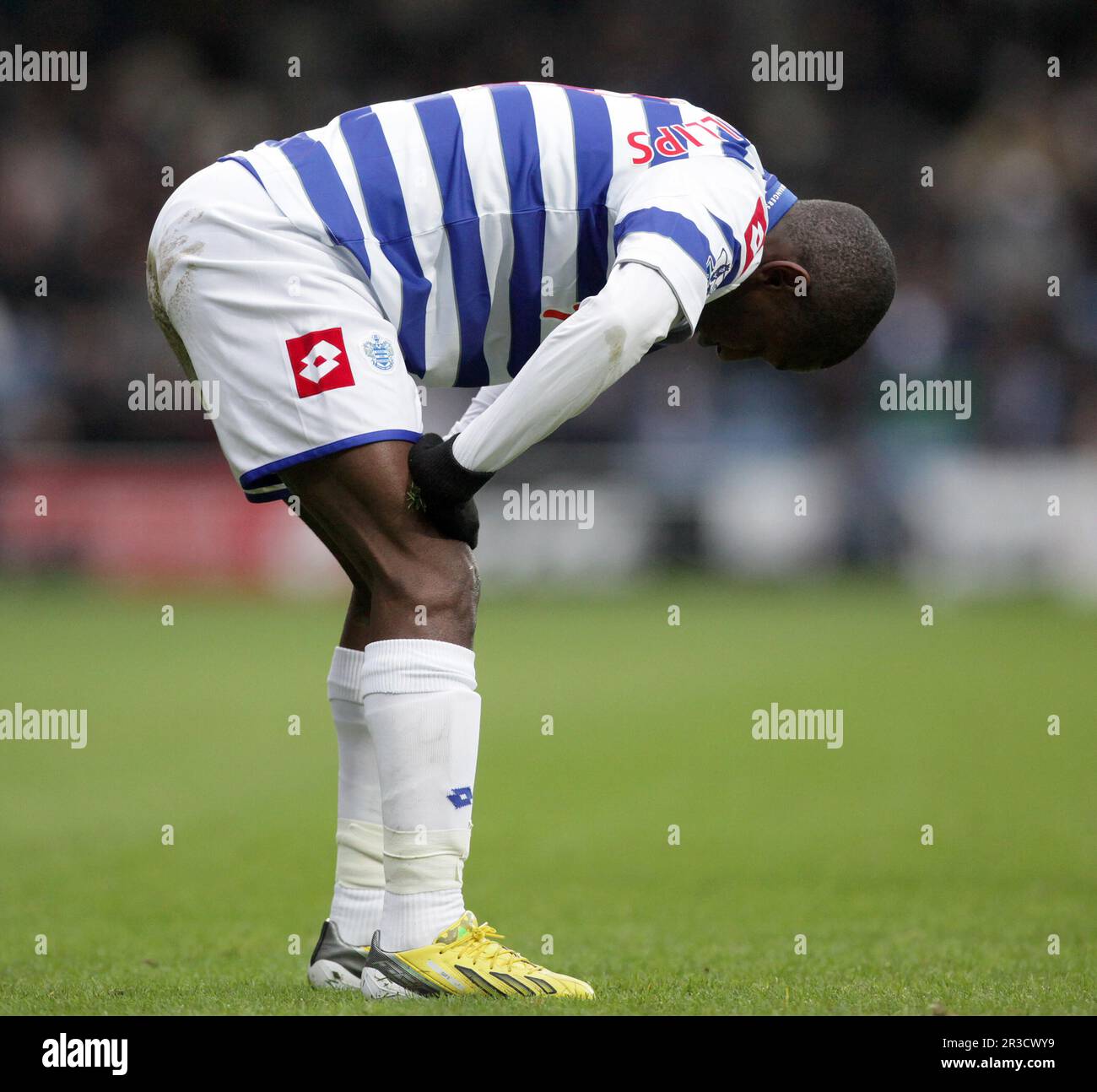 Queens Park Rangers' Shaun Wright Phillips takes a blow in the face and ...